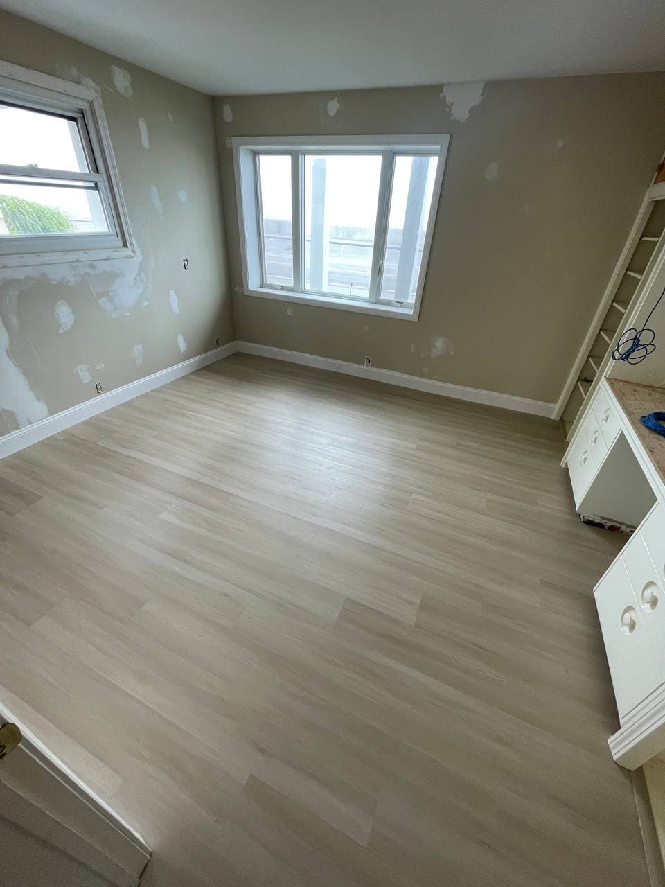 SV Flooring craftsman working on hardwood floor
